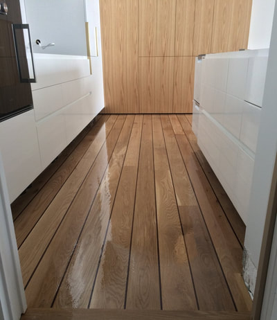 custom flooring for kitchens uses ships decking inspiration for boat style flooring